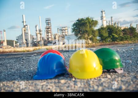 Construction hard hat safety tools equipment for workers in construction site for engineering protection head standard. Many hard hat helmet on row wi Stock Photo
