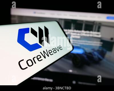 Germany. 7th June, 2025. In this photo illustration, a smartphone with the logo of US AI cloud computing company CoreWeave Inc. is seen on screen in front of website. (Credit Image: © Timon Schneider/SOPA Images via ZUMA Press Wire) EDITORIAL USAGE ONLY! Not for Commercial USAGE! Stock Photo