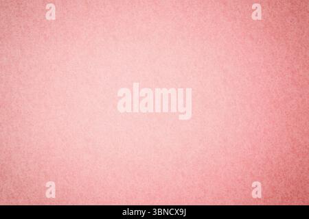 Textured pastel pink surface filling frame in flat design with fine grain texture, copy space Stock Photo