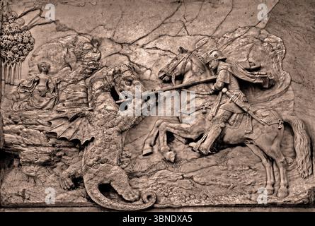 Saint George and the Dragon, sculpted by master artist Michel Colombe in 1509 for the Château de Gaillon chapel,  Louvre Museum in Paris, Stock Photo