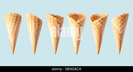 Various ice cream cones isolated on blue background. Banner design. Stock Photo