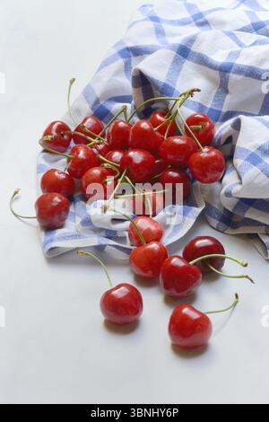 Sweet cherries with cloth, Prunus avium Stock Photo