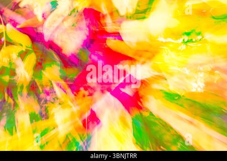 A vibrant explosion of abstract colors blending brilliantly in an artistic composition. This dynamic image showcases the concept of chromadynamics, hi Stock Photo