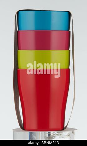 Plastic cups of many colors are stacked in rows Stock Photo