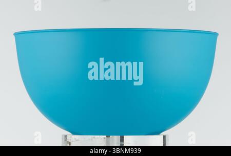 Empty Solid Blue Plastic Cup with Straight Angle Stock Photo