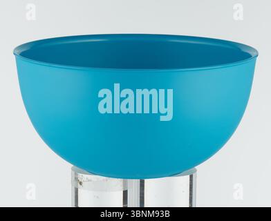 Empty solid blue plastic cup Stock Photo