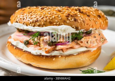 Healthy Homemade Lox Bagel Sandwich for Breakfast with Capers Dill and Cream Cheese Stock Photo