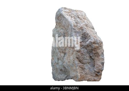 A large rock is sitting on a white background. The rock is grey and has a rough texture Stock Photo