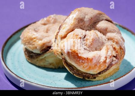 UK. A close up image of cinnamon rolls or buns on a plate. Stock Photo