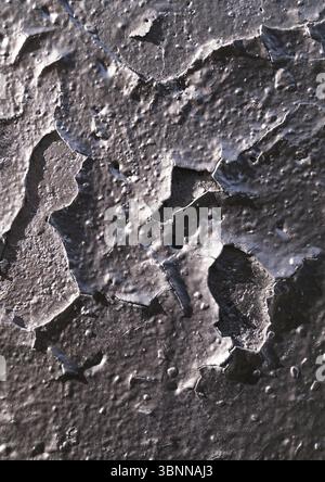 Silver wall with peeling paint Stock Photo