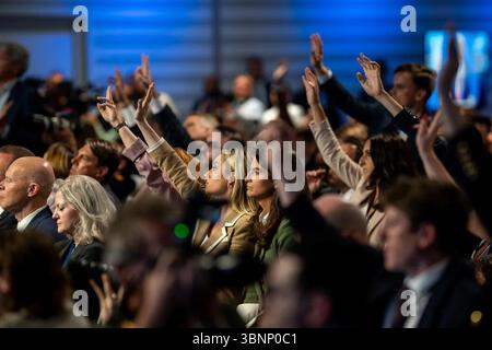 Journalists raise hands to ask questions at the 2025 NATO Summit in The Hague. June 25, 2025. Image Courtesy of the White House. Stock Photo
