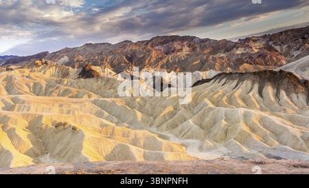 Sunset at Zabriskie point in Death Valley national park Eastern California in the northern Mojave Desert. One of the hotest places on earth Stock Photo
