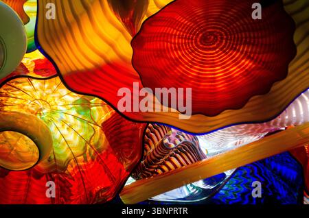 Colorful ceiling in a walking path of a conservatory. Beautiful colors and contrast with the light from above shining through. Stock Photo