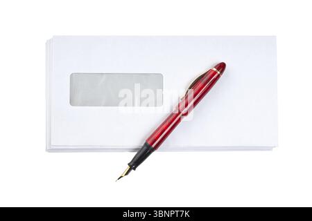 Stack of mail envelopes and a pen isolated on white background Stock Photo