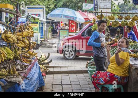 Bogor, Indonesia - October, 30, 2017 Woman selling bananas on a market in Bogor, West Java, Indonesia, Bogor, Indonesie, Asia Stock Photo
