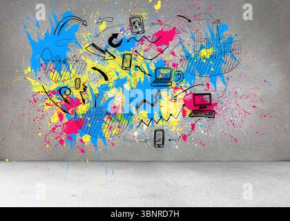 Colorful splashes on grey wall with graphics Stock Photo