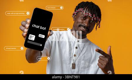 Innovative user showcasing chatbot features with smartphone against vibrant orange background in creative setting Stock Photo