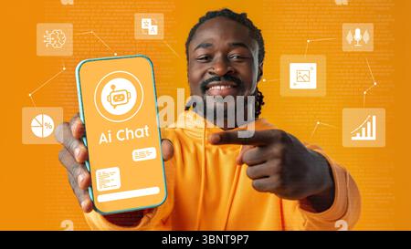 Smiling man showcasing AI chat application on smartphone with vibrant background in technology-focused setting Stock Photo