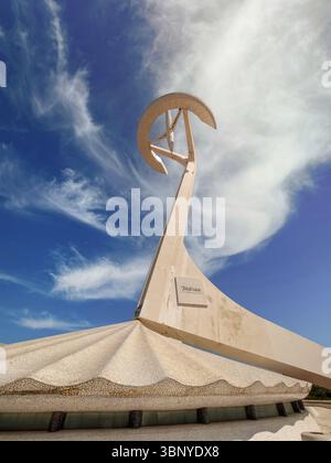 The futuristic Montjuïc Communications Tower by Santiago Calatrava against a dramatic blue sky with wispy clouds, Barcelona, Spain. Stock Photo