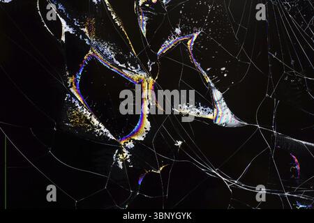 Background texture cracks on the broken screen of a liquid crystal display, computer monitor or TV Stock Photo