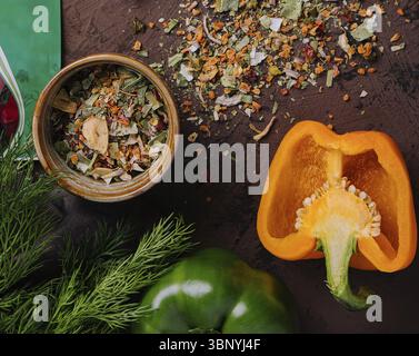 food still-life, Various spices for dish with peppers top view Stock Photo