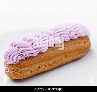 Fresh tasty eclairs isolated on white background Stock Photo