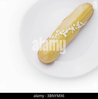 Delicious eclair with custard on plate top view Stock Photo