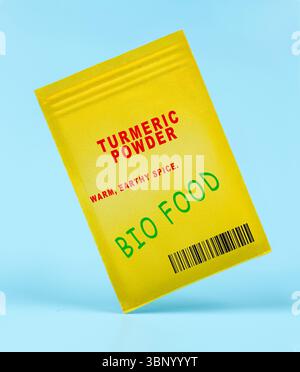 Turmeric powder. Warm, earthy spice. Dried and ground turmeric root, used for colour and subtle earthy flavour in baking. Stock Photo