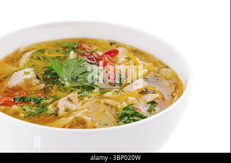 food still-life, Chicken noodle soup in a white ceramic bowl isolated on white Stock Photo