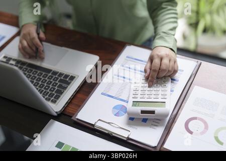 Close up Millennial confident Female working in creative office Stock Photo