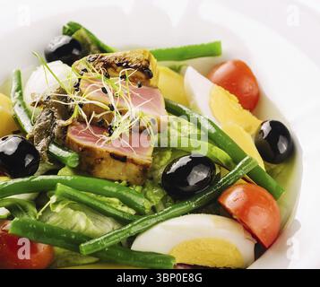 food still-life, Nicoise salad with tuma and tomato Stock Photo