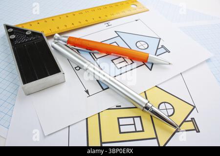 Development drawings and tools on graph paper Stock Photo