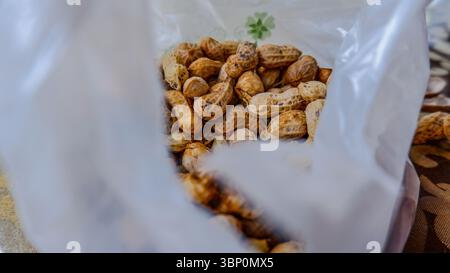 Boiled peanuts in plastic bag Stock Photo
