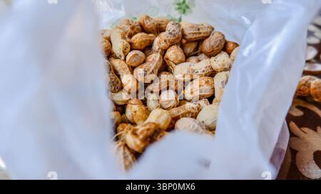 Boiled peanuts in plastic bag Stock Photo