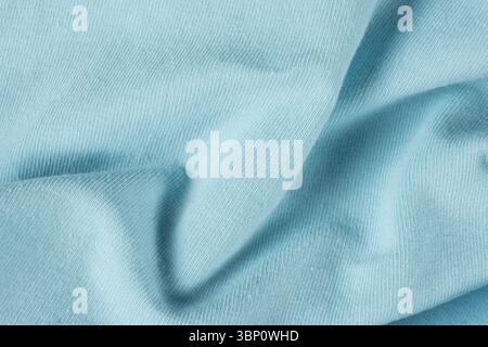 Macro texture of blue fabric consisting of cotton with a slight addition of spandex Stock Photo