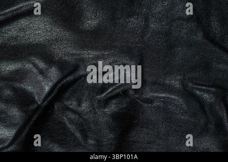Close-Up of Dark Leather Surface for Design Use. Stock Photo
