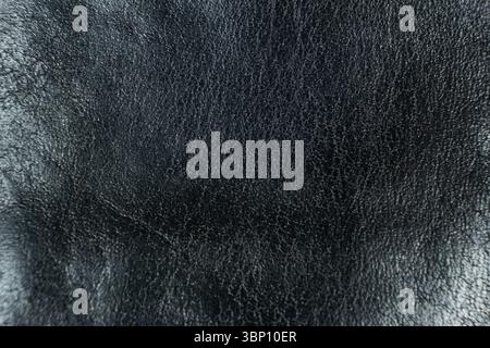 Minimalist Black Leather Texture Close-Up. Stock Photo