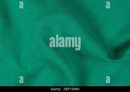 Close-Up of Abstract Green Emerald Cotton Textile Surface Top View. Stock Photo