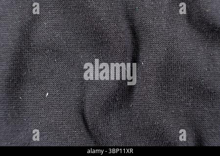 Close-Up of Old Cotton Polyester Elastane Fabric with Pilling Texture. Stock Photo