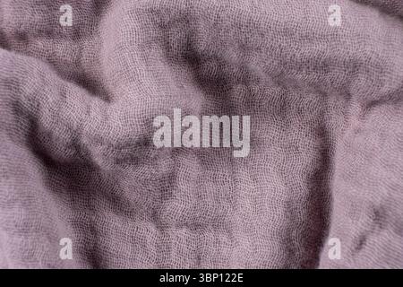 Purple Muslin Fabric Macro Texture, Soft Natural Textile Surface. Stock Photo