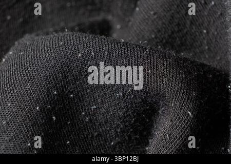 Close-Up of Old Cotton Polyester Elastane Fabric with Pilling Texture. Stock Photo