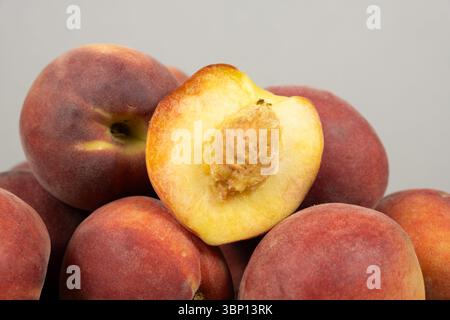 Fresh Peaches in a Pile. Natural Colorful Fruit. Stock Photo