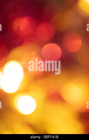 Vertical Blurred Christmas Lights with Cozy Atmosphere. Stock Photo