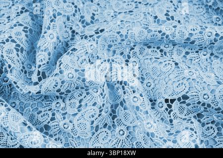 Blue lace with flower shape texture, Textile background. Stock Photo