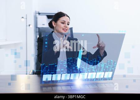 Building information modelling. Woman using virtual screen in office Stock Photo