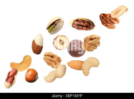 Peanut and other nuts flying on white background Stock Photo