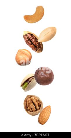 Peanut and other nuts falling on white background Stock Photo