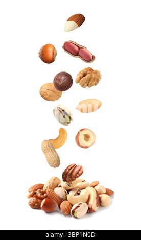 Peanut and other nuts falling on white background Stock Photo