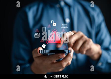 Cybersecurity warning alert on smartphone and digital threat symbols for hacking, phishing, malware Stock Photo