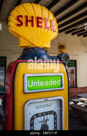 Restored old Shell filling station with original pumps built around ...